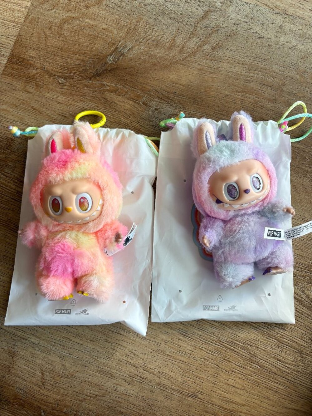 Two Popmart the monsters Labubus